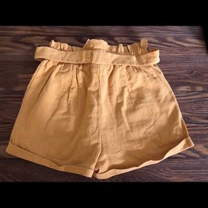 New with tags. Lined shorts with tie.